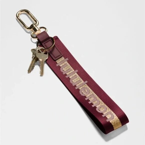lululemon athletica Accessories - NWT Never Lost Keychain - Deep Luxe/Gold/Bone